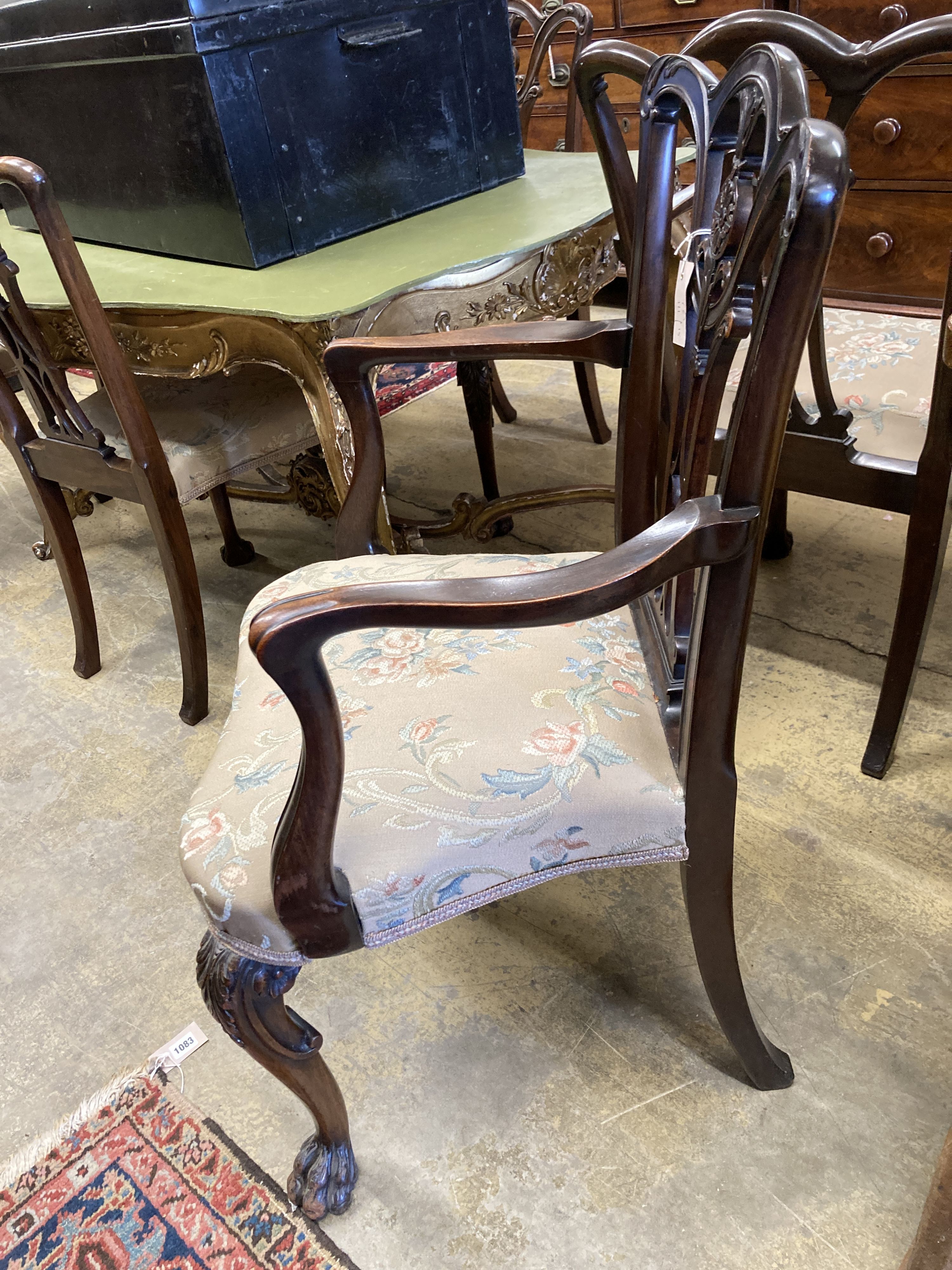 A set of six George III style mahogany dining chairs (two with arms)